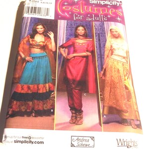 May include: Simplicity costume pattern for adults. The pattern features three costume designs: a blue and orange skirt and top, a red pantsuit with a cape, and a gold skirt and top. The pattern includes the text "Costumes for adults."