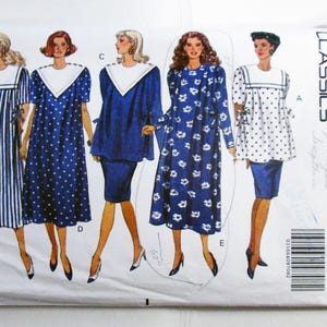May include: A vintage Butterick Classics sewing pattern, featuring five dress designs. The dresses are in various styles, including polka dots, floral prints, and stripes, with white collars. The pattern includes sizes 14-16-18-20. The text "CAST & EASY" is visible.