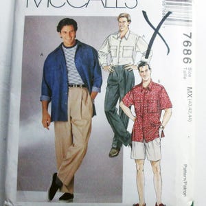 May include: McCall's sewing pattern featuring illustrations of men's shirts and pants. The pattern includes a denim shirt, a white button-up shirt, and a red patterned short-sleeve shirt. The size is MX (40,42,44).