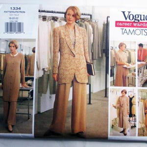 May include: A Vogue career wardrobe sewing pattern envelope labeled 1334 Tamotsu, featuring illustrations of a long-line blazer, wide-leg trousers, a long button-front tunic, and a skirt. The designs are shown in neutral beige and tan tones.