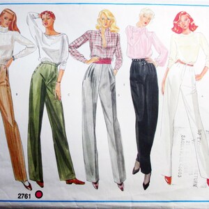 May include: A Vogue's Basic Design sewing pattern envelope, number 2761, featuring illustrations of five figures wearing various high-waisted trousers paired with different tops, including turtlenecks, blouses, and a plaid button-down shirt.