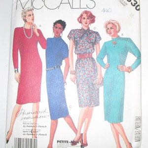 May include: McCall's sewing pattern featuring illustrations of four different dresses. The pattern includes the numbers 2830, 440, and 16. The text "Personalized instructions" and "Petite-Able" are also visible.