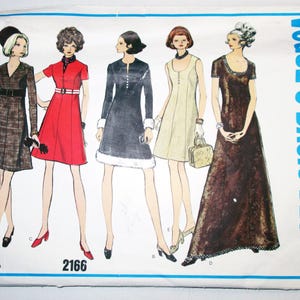 May include: Vintage Vogue Basic Design sewing pattern featuring five women's fashion illustrations. The designs include dresses in various styles, with a focus on the 1960s or 1970s era. The pattern number "2166" is visible.