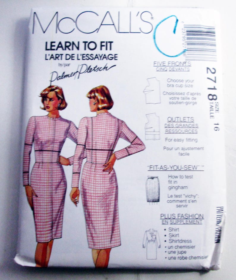 May include: A McCall's Learn to Fit sewing pattern envelope, size 16, featuring illustrations of a long-sleeved dress with a pink and white checkered pattern. The white paper packaging includes text in English and French, diagrams for fitting, and a barcode.