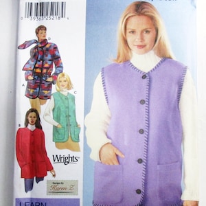 May include: A Simplicity 9883 sewing pattern envelope for a sleeveless vest with a whip stitch edge. The front shows a model wearing a lavender vest over a white turtleneck. Illustrations display variations including a patterned jacket and vests.
