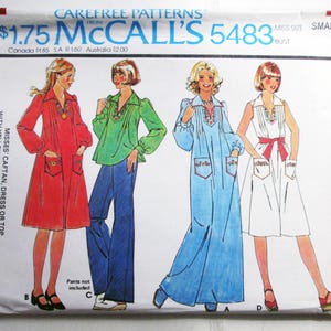 May include: A vintage McCall's 5483 sewing pattern envelope for a misses' caftan, dress, or top. The cover features illustrations of four garments in red, green, blue, and white, with embroidery details, pockets, and collars. Text includes $1.75.