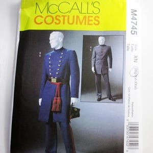 May include: McCall's Costumes sewing pattern featuring a blue military-style coat with gold buttons, a red sash, and matching pants. The pattern includes a smaller image of a gray coat. The pattern size is XN.