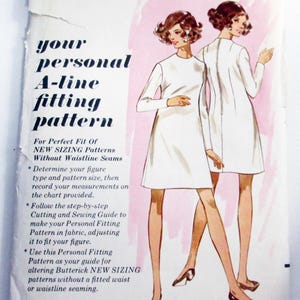 May include: Vintage Butterick sewing pattern for a personal A-line fitting pattern. The cover features illustrations of two women in white dresses. The pattern includes sizes 5/6-15/16 and bust size 32 inches.