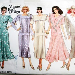 May include: Vogue's Basic Design sewing pattern featuring five vintage women's dress designs. The dresses are in various colors, including teal, lavender, cream, pink, and gray. The pattern number is 1846.