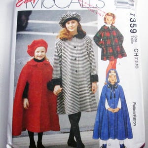 May include: McCall's sewing pattern featuring children's coats and capes. The pattern includes a red cape, a black and white checkered coat, a plaid coat, and a blue hooded cape. The pattern number is 7359.