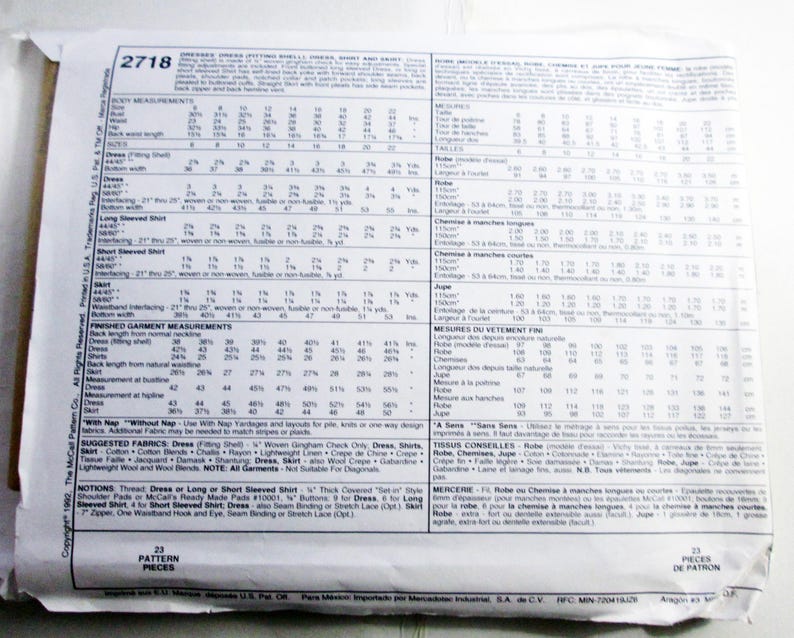 May include: A white paper sewing pattern envelope for McCall's pattern 2718, featuring detailed charts for body measurements, fabric yardage requirements in inches, and lists of notions for a dress, shirt, and skirt in sizes 8 through 22.