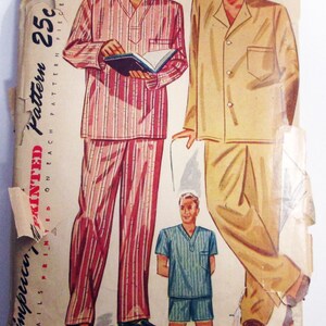 May include: Vintage Simplicity pattern 2207 featuring illustrations of men's pajamas in various styles. The main image shows a man in red and white striped pajamas, another in tan pajamas, and a third in blue shorts and a shirt. The pattern is priced at 25 cents.