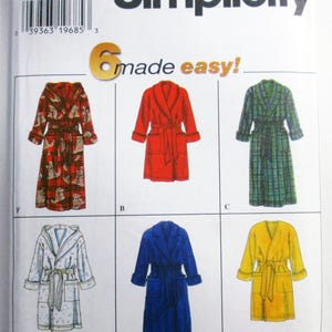 May include: Simplicity sewing pattern featuring six robe designs. The robes are shown in red, blue, green, yellow, and white. The pattern includes sizes BB and L, XL. The text "6 made easy!" is also visible.