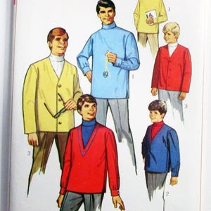 May include: A Simplicity 7889 sewing pattern envelope featuring illustrations of various tops and jackets. The designs include a light blue mock neck shirt, a yellow cardigan, a red cardigan, and a red pullover with a blue mock neck collar.