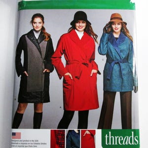 May include: Simplicity sewing pattern 1015 U5 featuring three coat designs. The pattern includes sizes 16-24. The image shows women wearing the coats in red, teal, and black. The pattern is designed and printed in the USA.