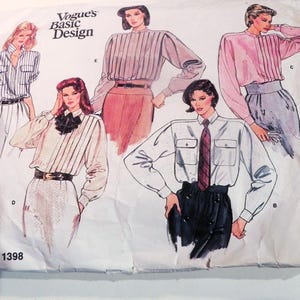May include: Vogue's Basic Design sewing pattern 1398 featuring illustrations of blouses with various sleeve lengths, collars, and details. The designs include striped and solid-colored options, with a range of styles from casual to more formal.