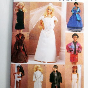 May include: A vintage Vogue Craft sewing pattern featuring doll fashions. The pattern includes designs for various doll outfits, including a wedding dress, a black dress, and other stylish ensembles. The pattern is labeled "9531" and "ONE SIZE".
