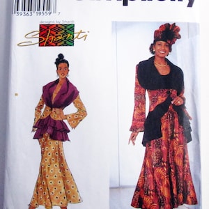 May include: Simplicity sewing pattern featuring two women's fashion designs. One design is a long, patterned dress with a ruffled bodice and a matching shawl. The other is a long dress with a matching jacket and hat. The pattern includes sizes 20, 22, and 24.