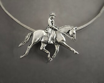 Dressage Horse charm necklace, sculptured horse & rider performing an extended trot in polished silvery pewter