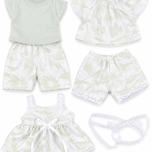 May include: A selection of doll clothing sets. The image shows a light green t-shirt and shorts, a white floral print top and shorts with lace edging, and a white floral dress with a bow. A white lace headband is also included.