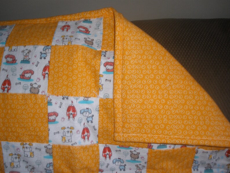 Dog Themed Orange and White Patchwork Quilt