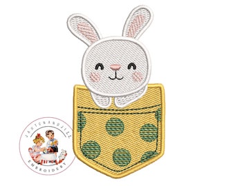 May include: White bunny peeking out of a yellow pocket with green polka dots.