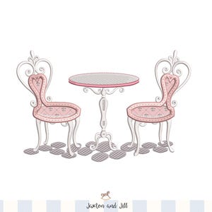 May include: An embroidered design of a small table and two chairs. The chairs and table are light pink with white accents. The chairs have heart-shaped backs. The table is round with a pink border. The design is on a white background.
