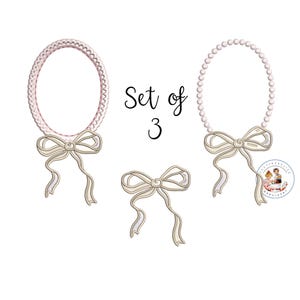 May include: Set of three white pearl and pink ribbon wreaths with bows. The wreaths are perfect for decorating a nursery or a child's room.