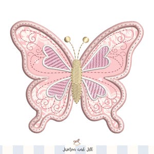 May include: A pink butterfly applique with intricate stitching and a floral pattern. The butterfly has a light pink outline and a textured, striped design on the wings. The antennae are gold, and the design is on a white background.