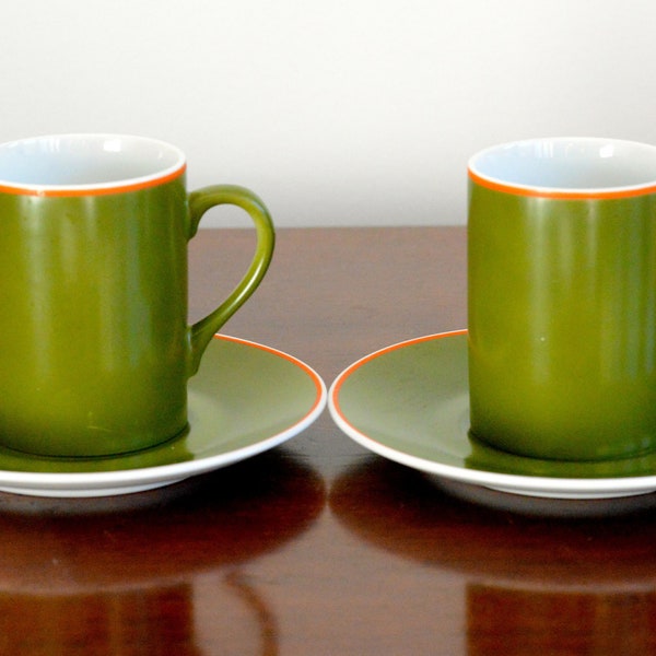 Kelco: four-piece cup and saucer set, olive green with bright orange rim