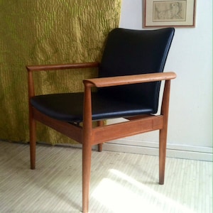 Finn Juhl Teak armchairs Diplomat chairs vintage Modern Danish furniture seating 20th c.design restored black cushion wood oil refinished