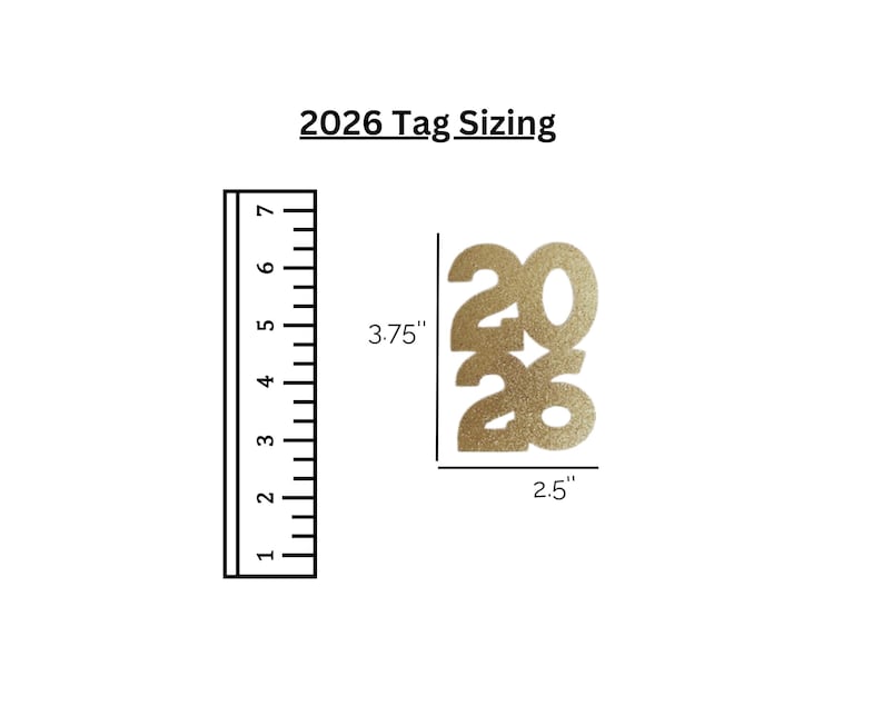 May include: Gold glitter paper tag cut-out in the shape of the year 2026. The tag is 3.75 inches tall and 2.5 inches wide. The text "2026 Tag Sizing" is above the tag. A ruler is to the left of the tag.