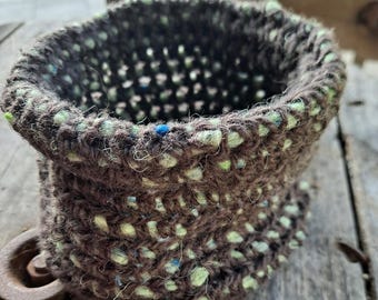 small crochet 'sack' made from wool yarns