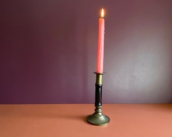 vintage single black porcelain and brass candlestick