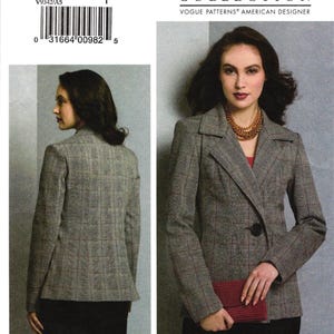 May include: A sewing pattern envelope for Vogue Patterns V9342, Claire Shaeffer's Custom Couture Collection. The pattern features a grey plaid blazer with a notched collar, princess seams, welt pockets, and two-piece sleeves, shown in front and back views.