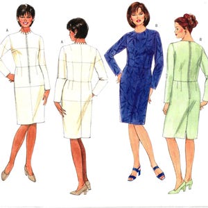 May include: A sewing pattern illustration featuring two dress designs. Design A is a long-sleeved, knee-length white dress with a front zipper and scalloped neckline. Design B is a long-sleeved, knee-length blue dress with a leaf pattern and back zipper.