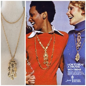 Necklace with sweater on sale
