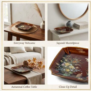 May include: A square, brown ceramic tray featuring a detailed, multi-colored floral and bird illustration on its surface. The tray has slightly raised, curved edges and a glossy finish, showcasing a botanical design with yellow, white, and blue flowers.