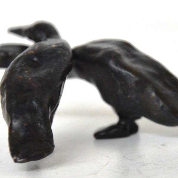 Bronzen sculptuur van kleine vogels