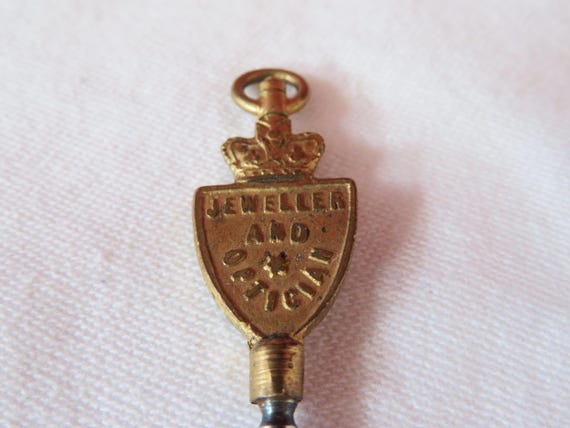 Antique Advertising Pocket Watch Key with Crown Top - 1900's - Kitchen Jewellers & Opticians, Westgate, Shipley View 3