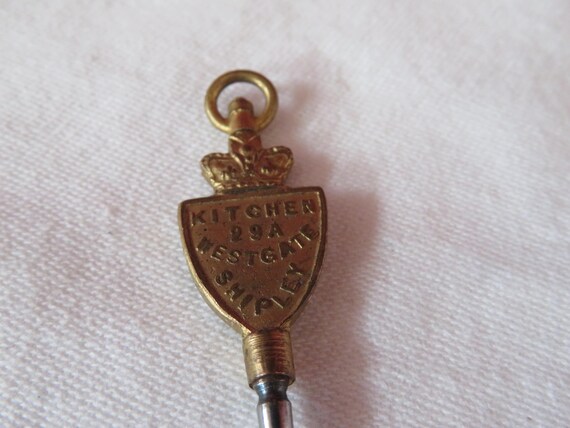Antique Advertising Pocket Watch Key with Crown Top - 1900's - Kitchen Jewellers & Opticians, Westgate, Shipley View 6