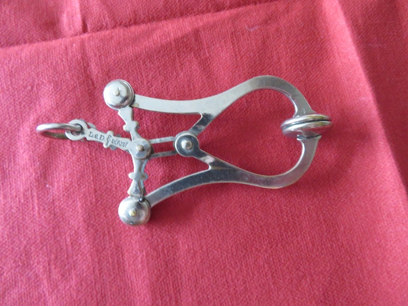 silver skirt lifter