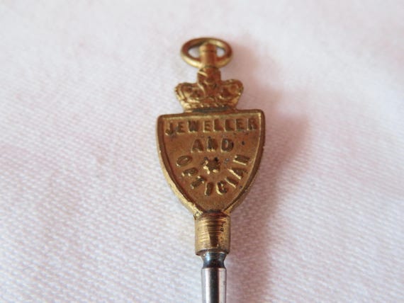 Antique Advertising Pocket Watch Key with Crown Top - 1900's - Kitchen Jewellers & Opticians, Westgate, Shipley View 5