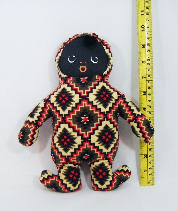 black baby doll toy