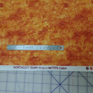 Northcott Studios Textures Sponge Orange Cotton Fabric