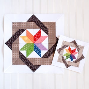 May include: Two fabric squares with a colorful star design in the center. The larger square has a brown border and the smaller square has a tan border.