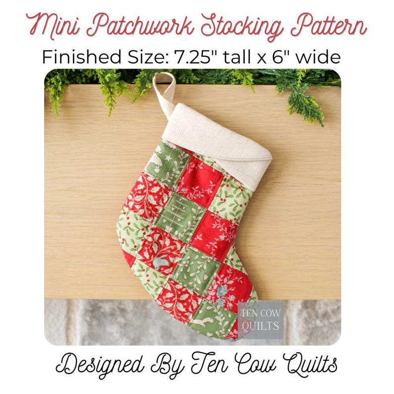 May include: A mini patchwork Christmas stocking with a cream cuff and hanging loop. The stocking is made of red and green patchwork squares with floral and holiday patterns. Finished size is 18.4 cm tall by 15.2 cm wide. Designed by Ten Cow Quilts.