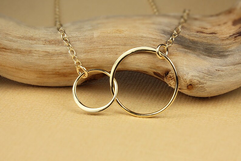 JESSICA WOGNSO Two Circles Intertwined Logo