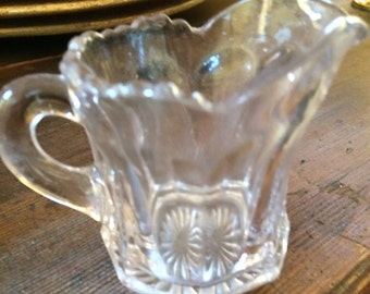 Old and  Small Glass Pitcher