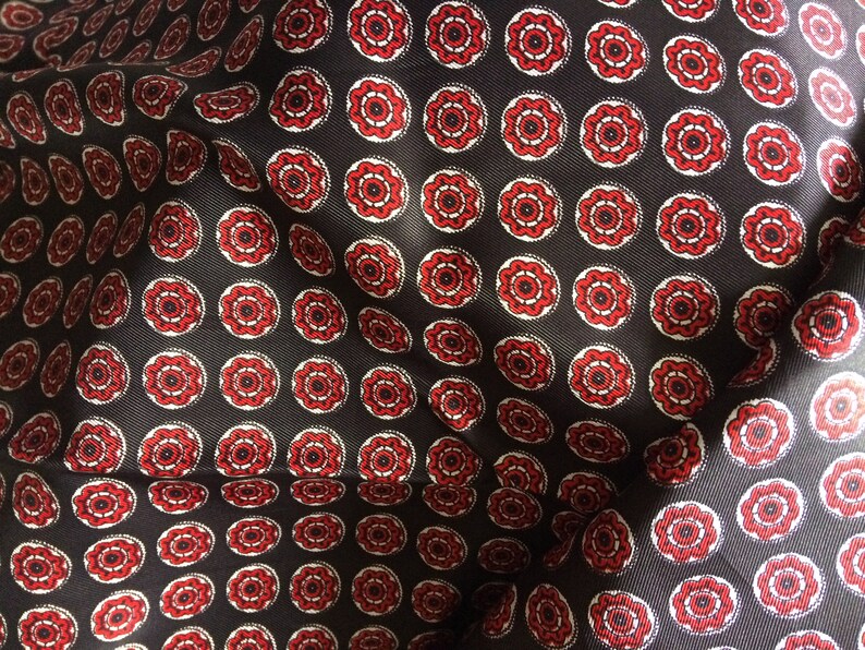 Red Medallions on Black Print Taffeta-like Fabric